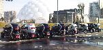 Vehículos Renault Twizy estacionados junto a la Cúpula del Milenio